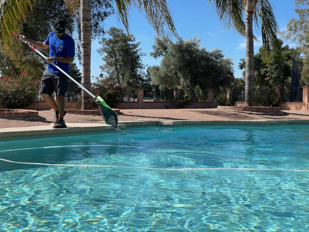 CaptainPools crew cleaning a pool in scottsdale, AZ.